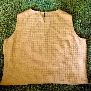 Light peach and cream sequence top. Dry clean only. 28% Rayon